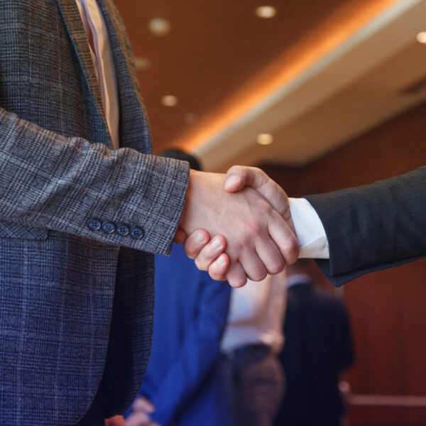 Businessmen shake hands